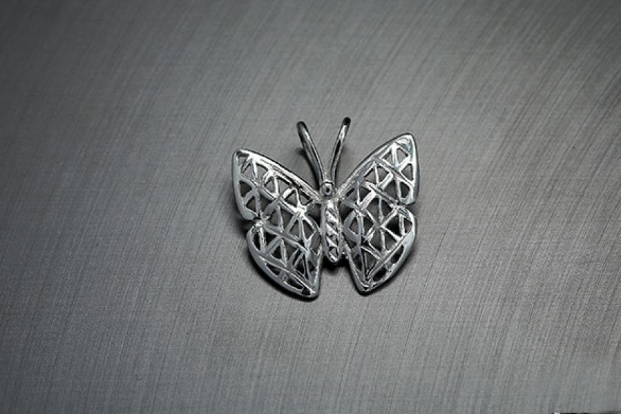 Ezüst medál pillangó